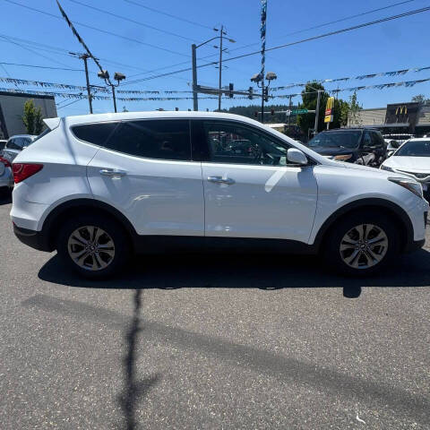 hyundai santa fe 2016 5XYZTDLBXGG340120 image hyundai santa fe 2016 5XYZTDLBXGG340120 image